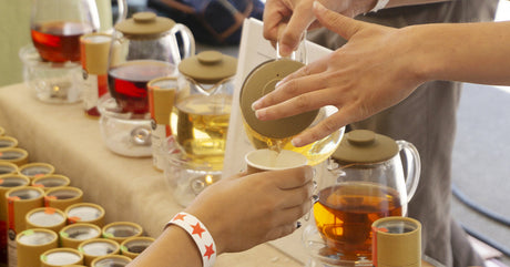 Young Mountain Tea pouring tea at the PDX tea fest